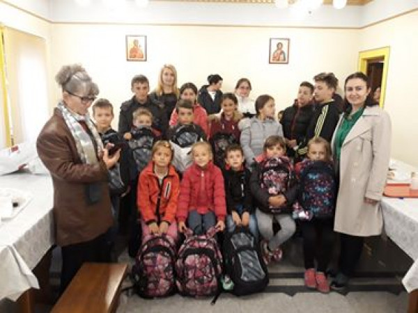 Podjeljen 21 ruksak sa školskim priborom